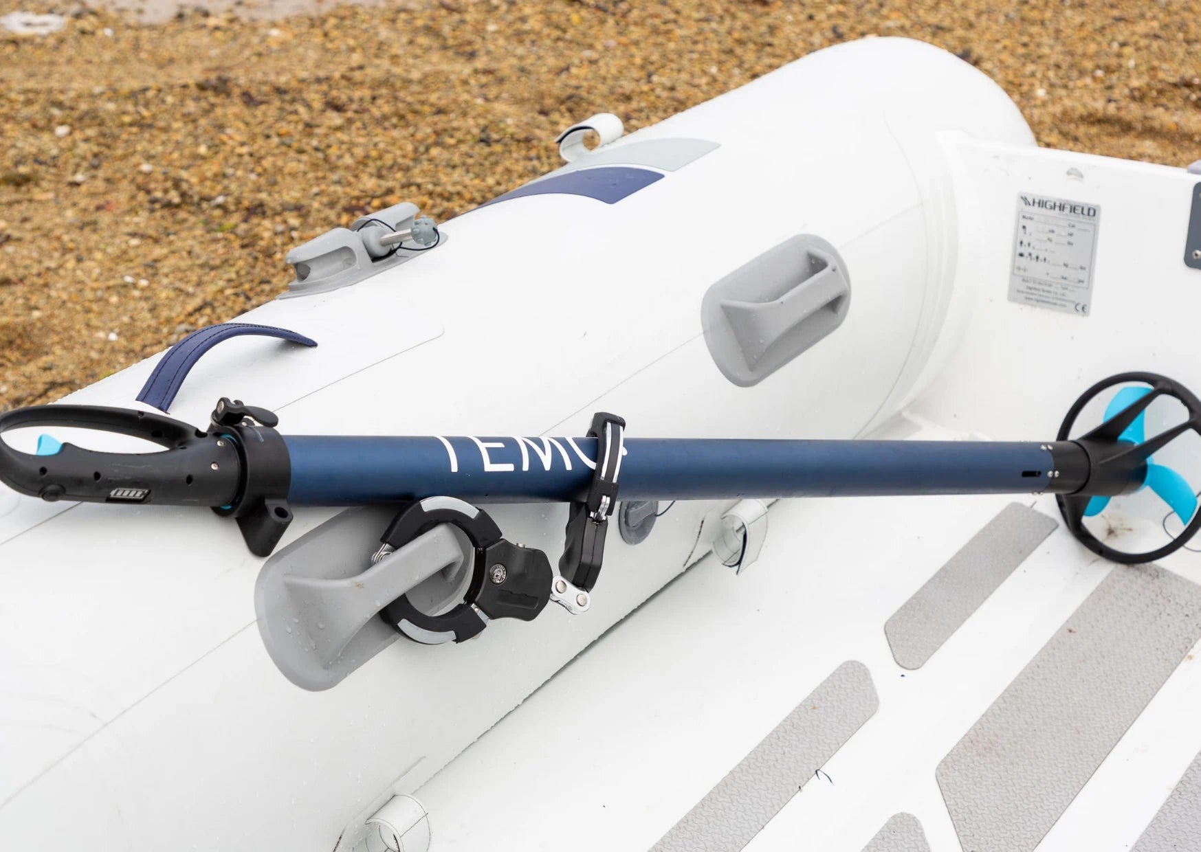 temo 450 outboard motor secured to a dinghy with its lock